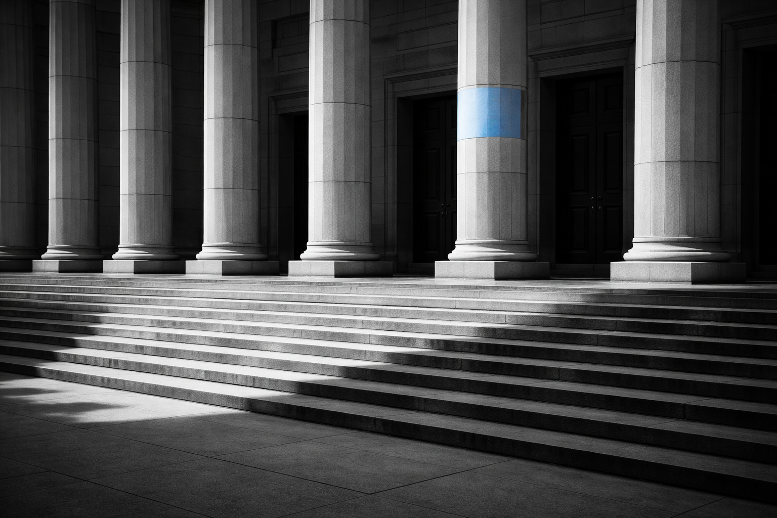 Government building entrance with stone steps in midday sunlight — India rental housing policy Budget 2026