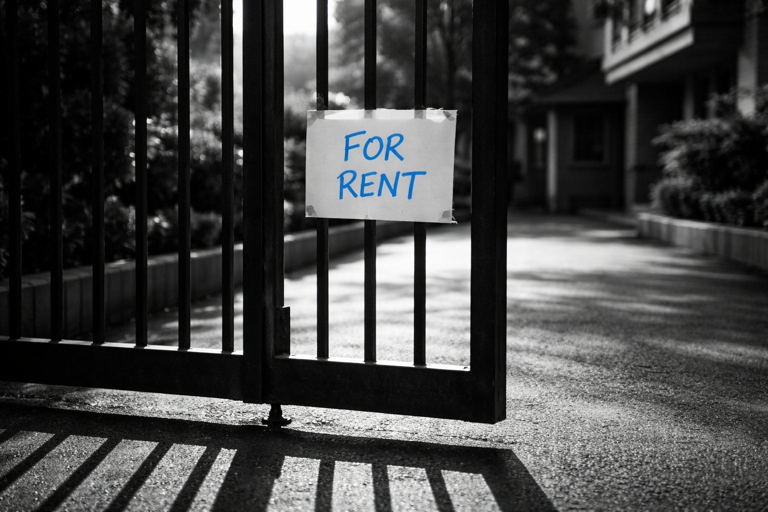 Residential society gate with for rent sign in morning sunlight — Gurgaon 2BHK rental listing